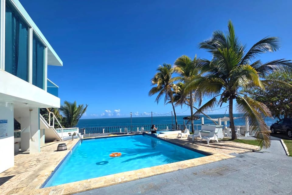 Property building, Day, Natural landscape, Pool view, Sea view, Swimming pool