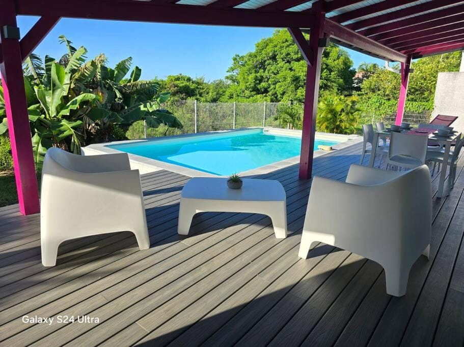 Patio, Day, Dining area, Pool view, Swimming pool