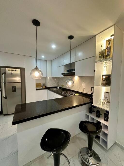 Kitchen or kitchenette, minibar, stove