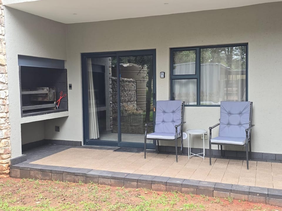 Property building, Patio, Seating area, Garden view
