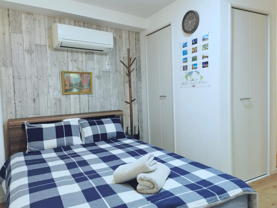 Bed, Bedroom, towels, wardrobe, air conditioner