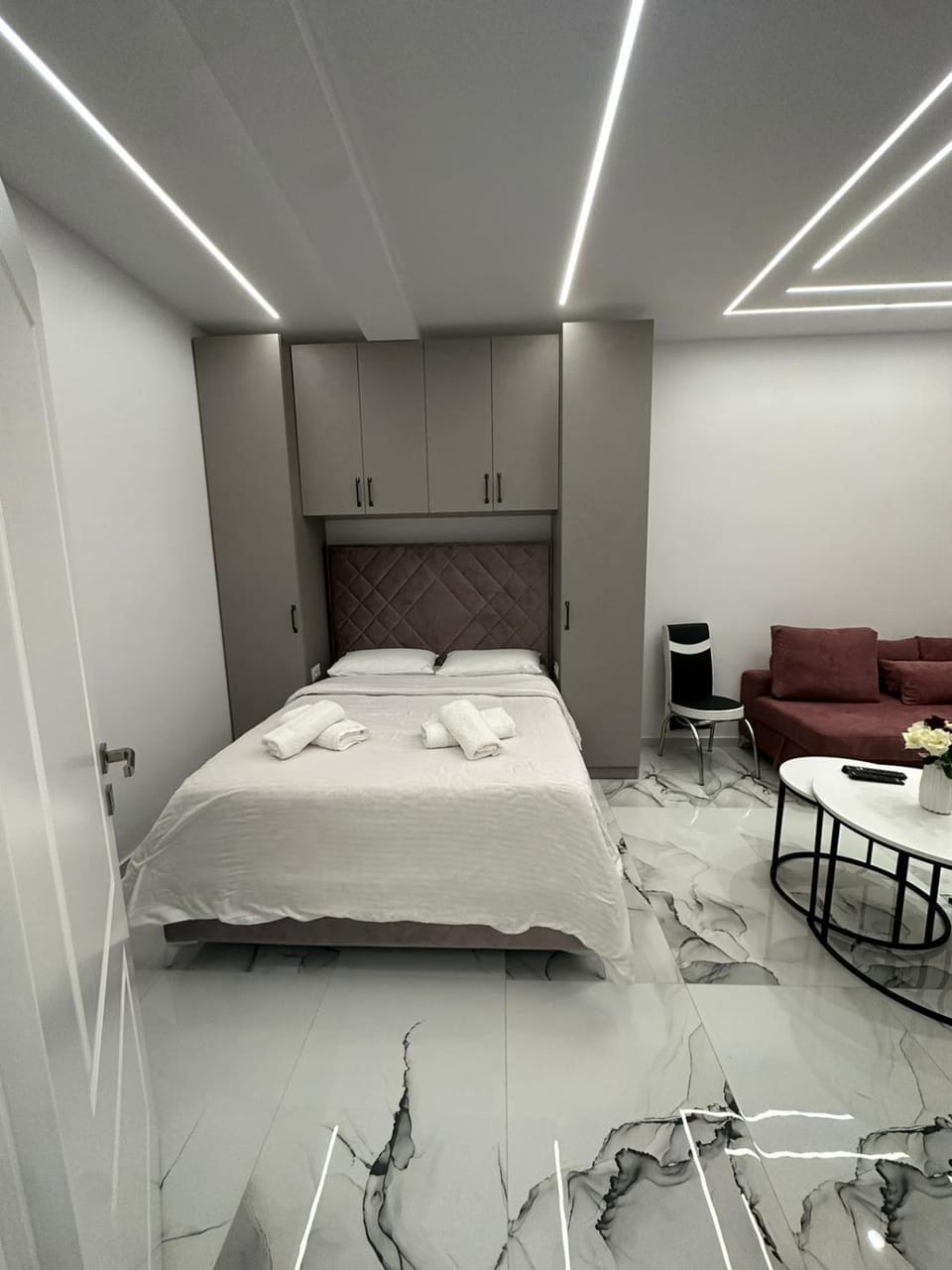 Bed, Living room, Seating area, Bedroom