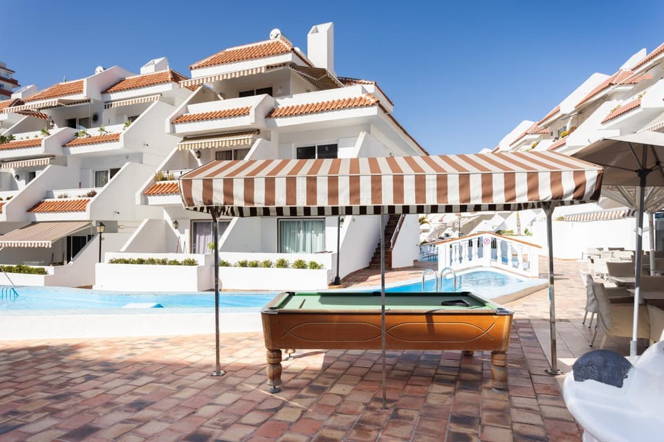 Home2Book Vibrant Las Américas Apt, Pool Retreat Apartment in Playa de las Americas