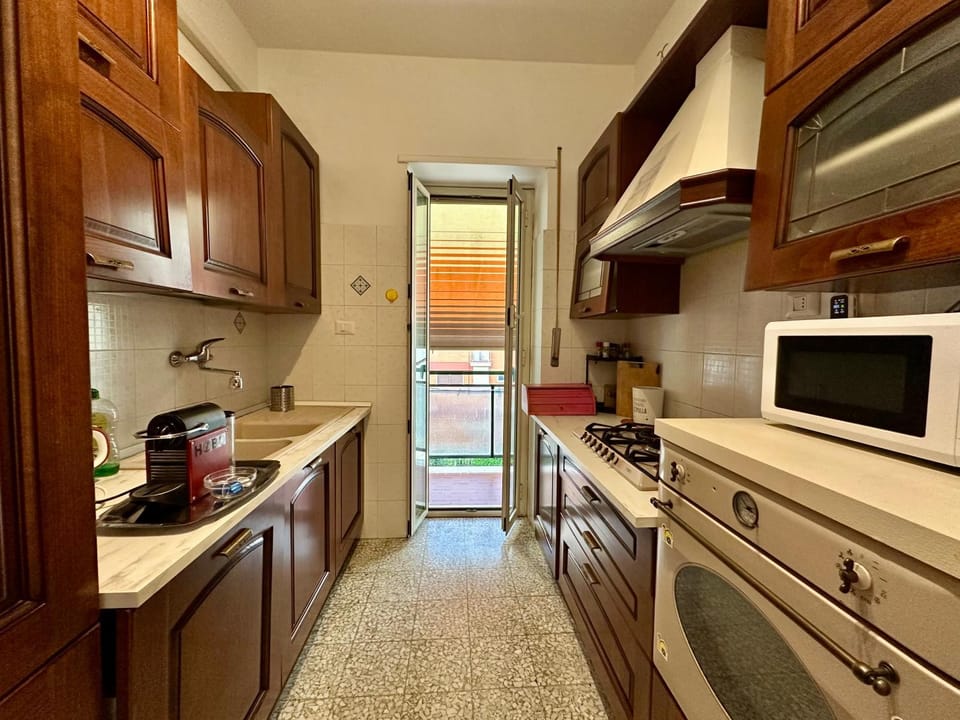 Kitchen or kitchenette, dishwasher, oven, stove, toaster