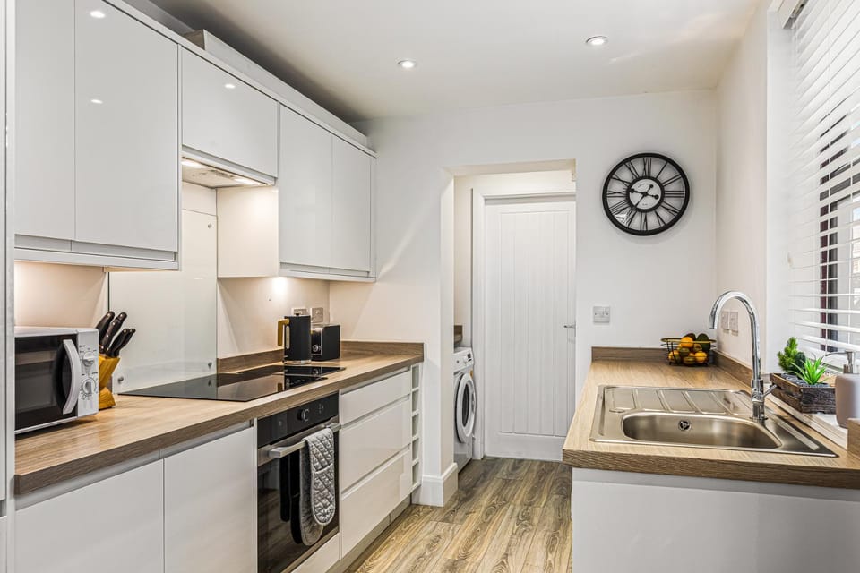 microwave, oven, stove, washing machine, kitchen