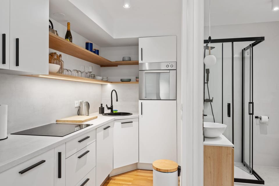 Kitchen or kitchenette, dishwasher, oven, stove
