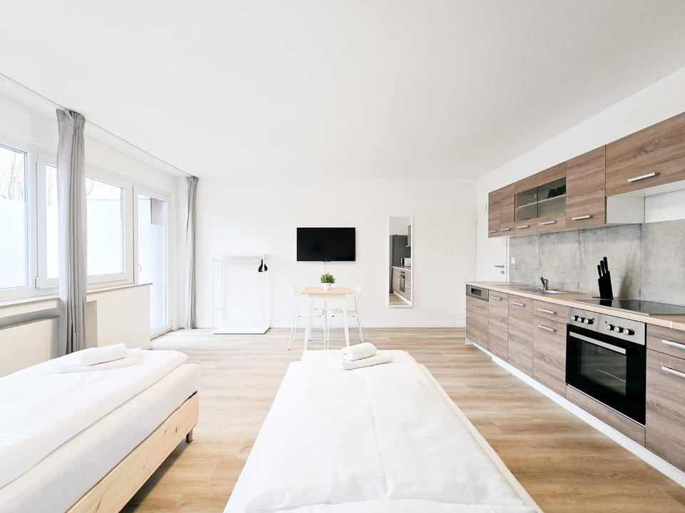 Bed, TV and multimedia, Coffee/tea facilities, Photo of the whole room, Bedroom, dishwasher, heating, microwave, oven, stove, towels, wardrobe, kitchen
