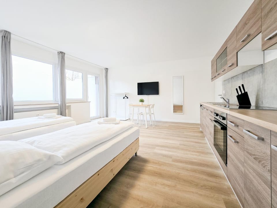 Bed, TV and multimedia, Coffee/tea facilities, Photo of the whole room, Bedroom, dishwasher, heating, microwave, oven, stove, towels, wardrobe, kitchen