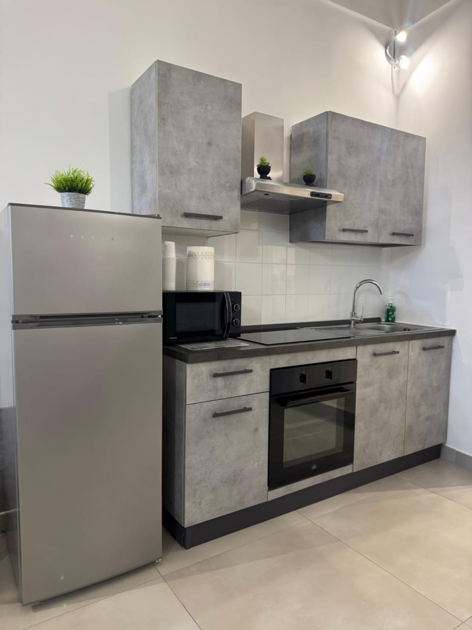Kitchen or kitchenette, oven