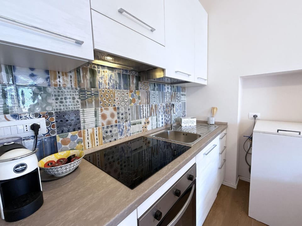 Kitchen or kitchenette, oven, stove