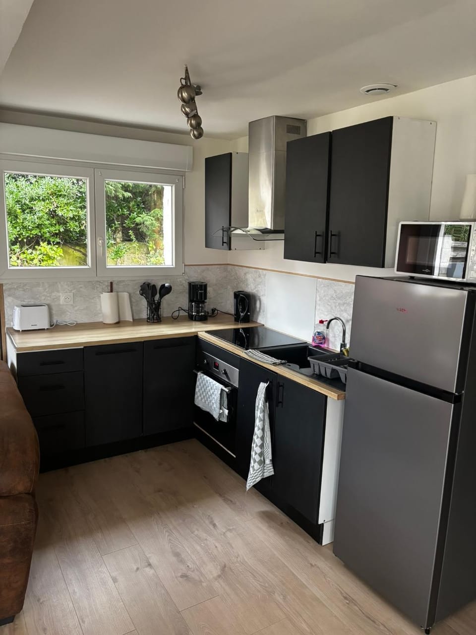 Kitchen or kitchenette, oven, stove, toaster