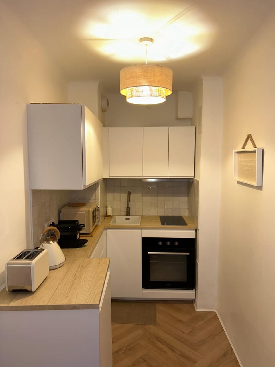 Kitchen or kitchenette, oven, stove, toaster