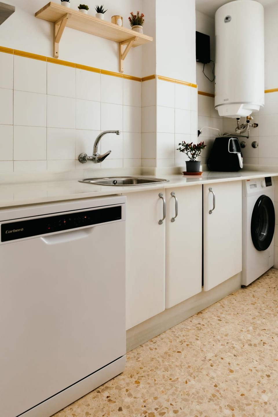 Kitchen or kitchenette, dishwasher, washing machine