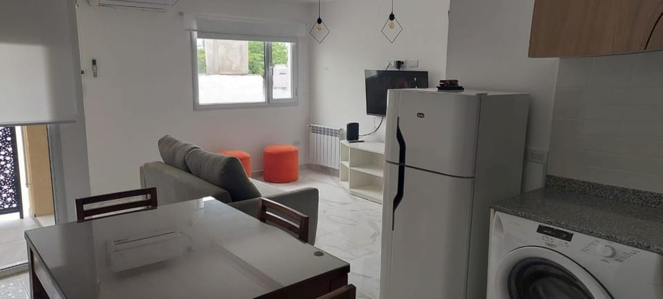Kitchen or kitchenette, Living room, Seating area, heating, oven, stove, washing machine