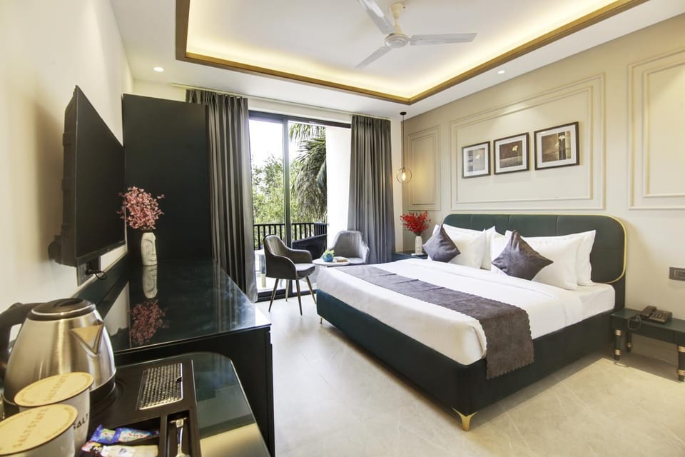 Communal lounge/ TV room, Bed, TV and multimedia, Coffee/tea facilities, Living room, Photo of the whole room, Seating area, Evening entertainment, Bedroom