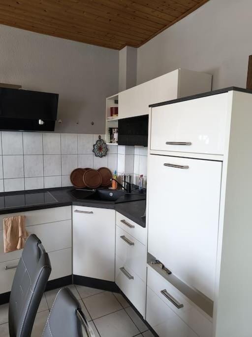 Kitchen or kitchenette, oven, stove