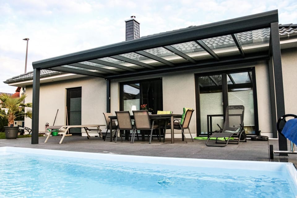 Property building, Living room, Swimming pool
