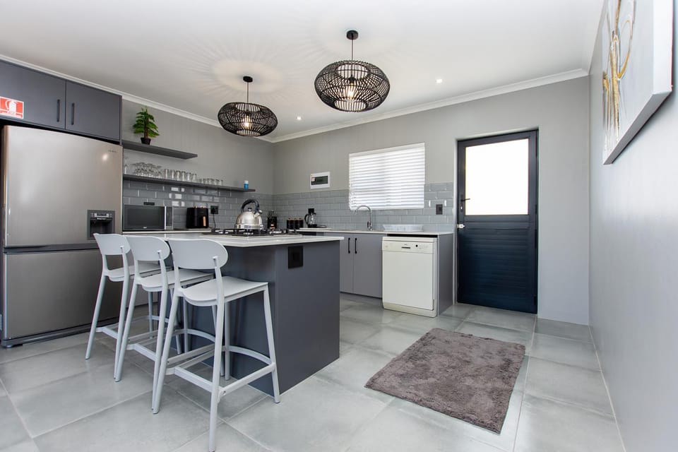 Kitchen or kitchenette, Dining area, dishwasher, oven, stove, toaster