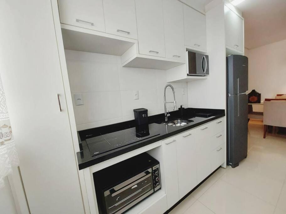 Kitchen or kitchenette, oven, stove