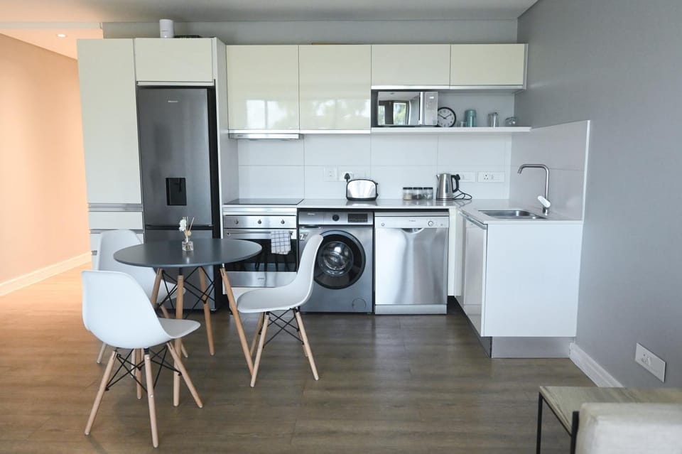 Kitchen or kitchenette, Dining area, dishwasher, oven, stove, toaster