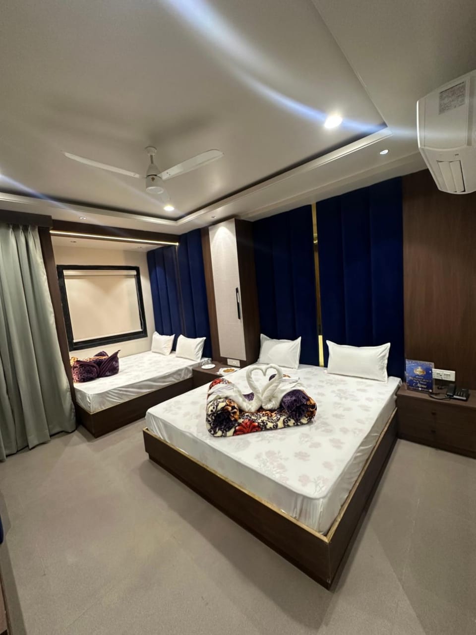 Bed, Photo of the whole room, Bedroom, towels, air conditioner