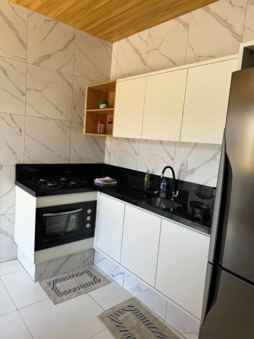 Kitchen or kitchenette, oven, stove