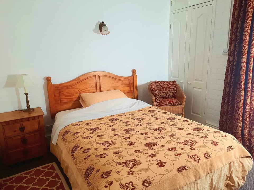 Bed, wardrobe