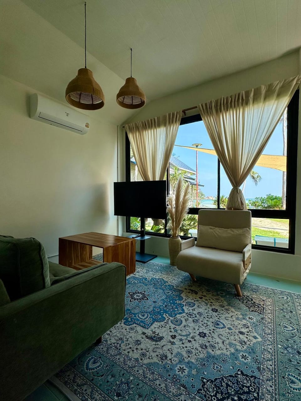 TV and multimedia, Living room, Seating area, Sea view, air conditioner
