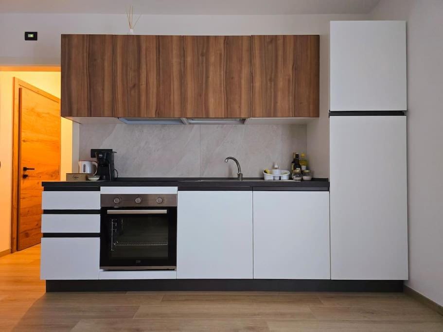 Kitchen or kitchenette, oven, stove