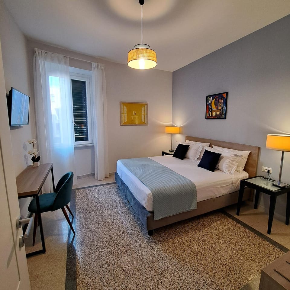 Bed, Living room, Seating area, Bedroom