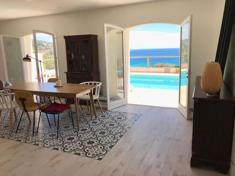 Patio, View (from property/room), Living room, Dining area, Pool view, Sea view, Swimming pool