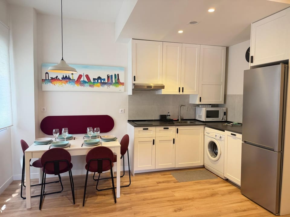 Kitchen or kitchenette, Dining area, dishwasher, stove, toaster, washing machine