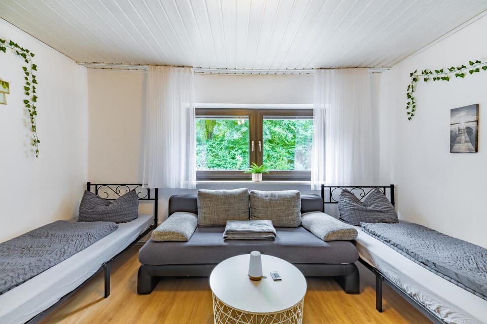 Bed, Living room, Seating area, Bedroom