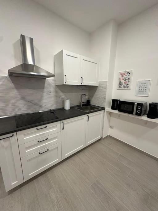 Kitchen or kitchenette, stove