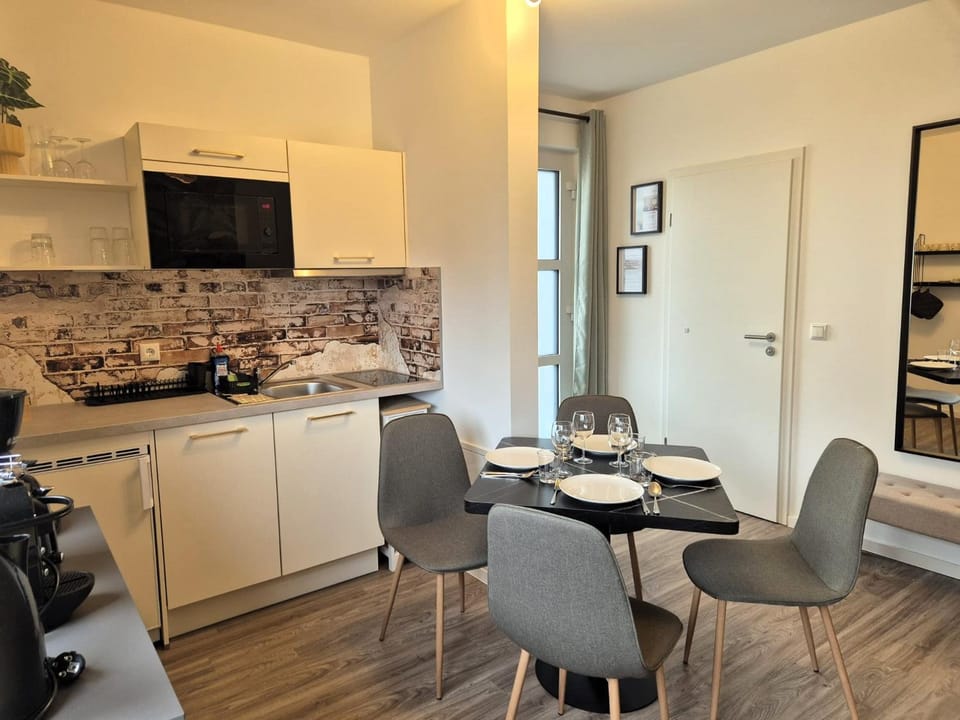 Kitchen or kitchenette, Seating area, Dining area, dishwasher, oven, stove