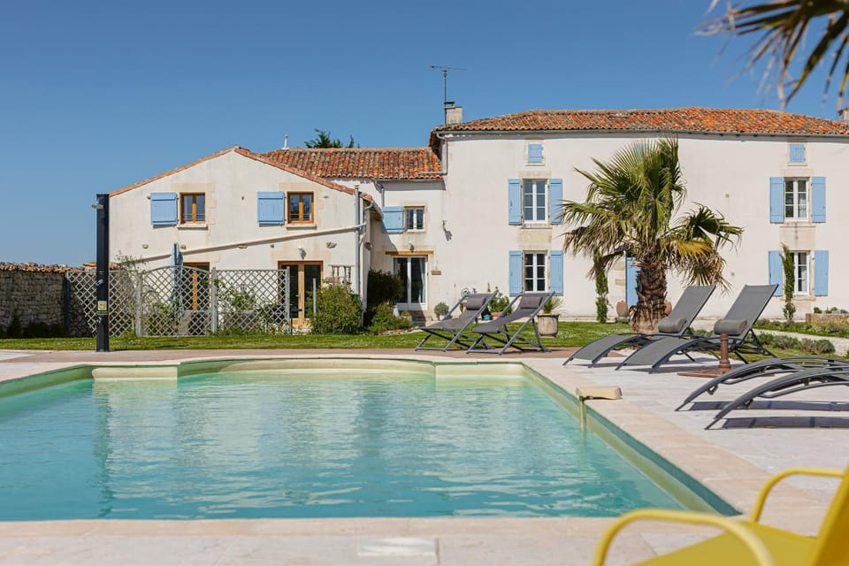 Property building, Living room, Swimming pool