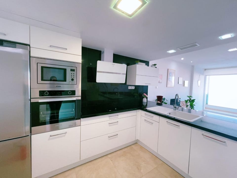 Kitchen or kitchenette, oven