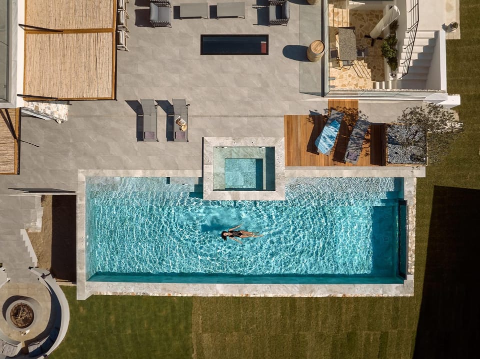 Patio, Day, Natural landscape, Pool view, Swimming pool, sunbed