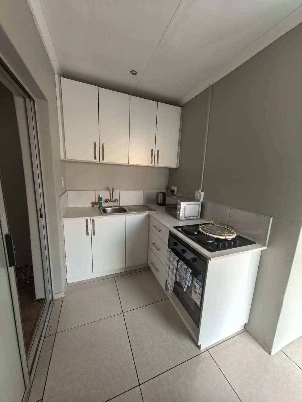 Kitchen or kitchenette, stove