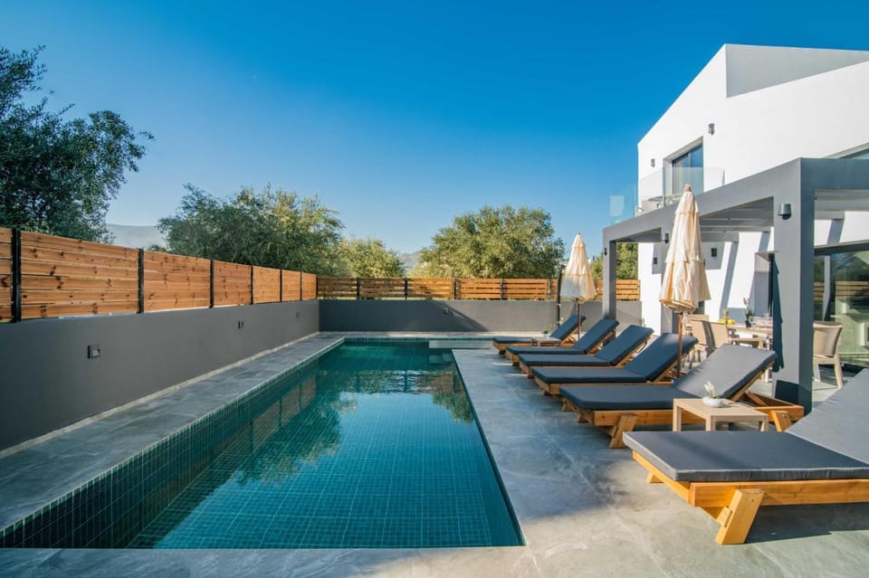 Patio, Day, Seating area, Pool view, Swimming pool, sunbed