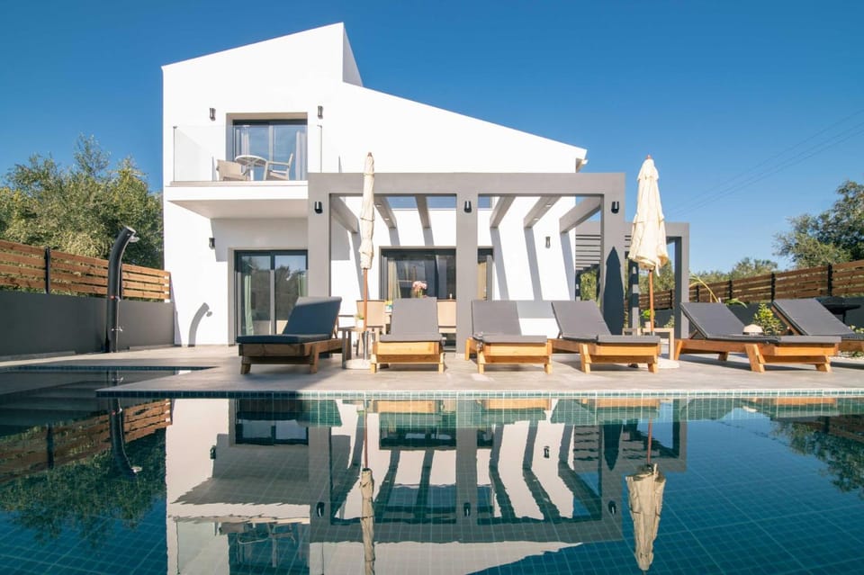 Property building, Patio, Day, Seating area, Pool view, Swimming pool, sunbed