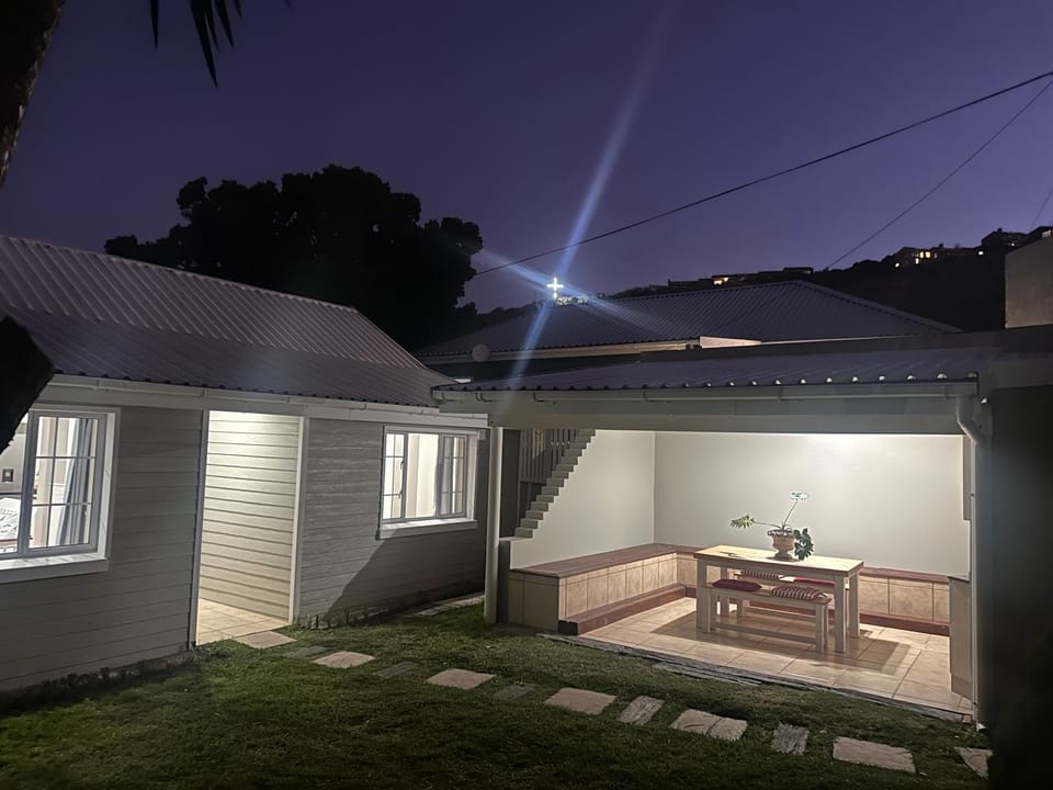 Property building, Night, Garden, Seating area, Dining area