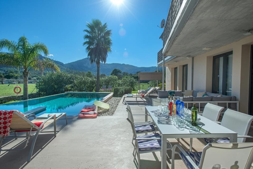 Property building, Patio, Natural landscape, Pool view, Swimming pool, sunbed