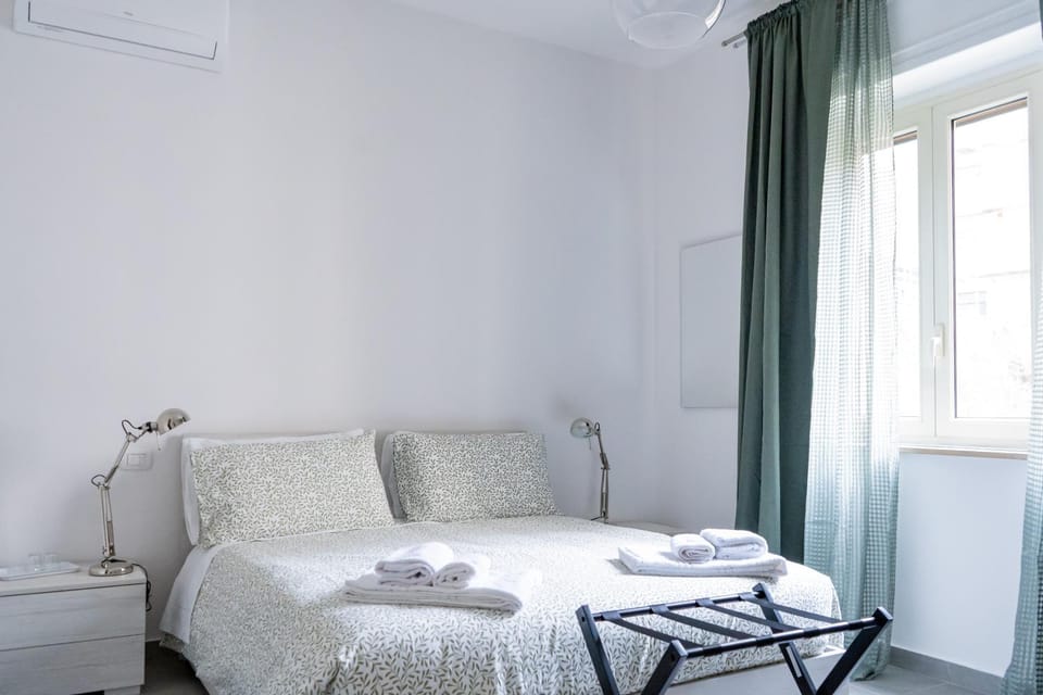 Bed, Photo of the whole room, Bedroom, towels, air conditioner