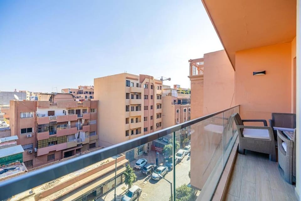 Property building, Patio, Communal lounge/ TV room, Day, View (from property/room), Balcony/Terrace, Living room, Seating area, Evening entertainment, City view