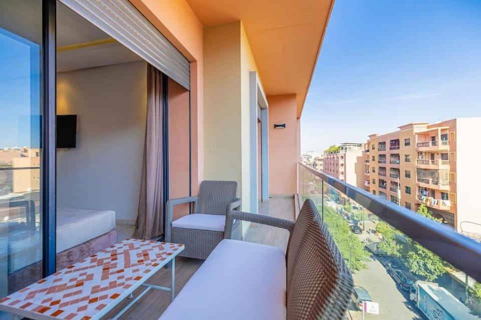 Property building, Patio, Communal lounge/ TV room, Day, View (from property/room), Balcony/Terrace, Living room, Seating area, Evening entertainment
