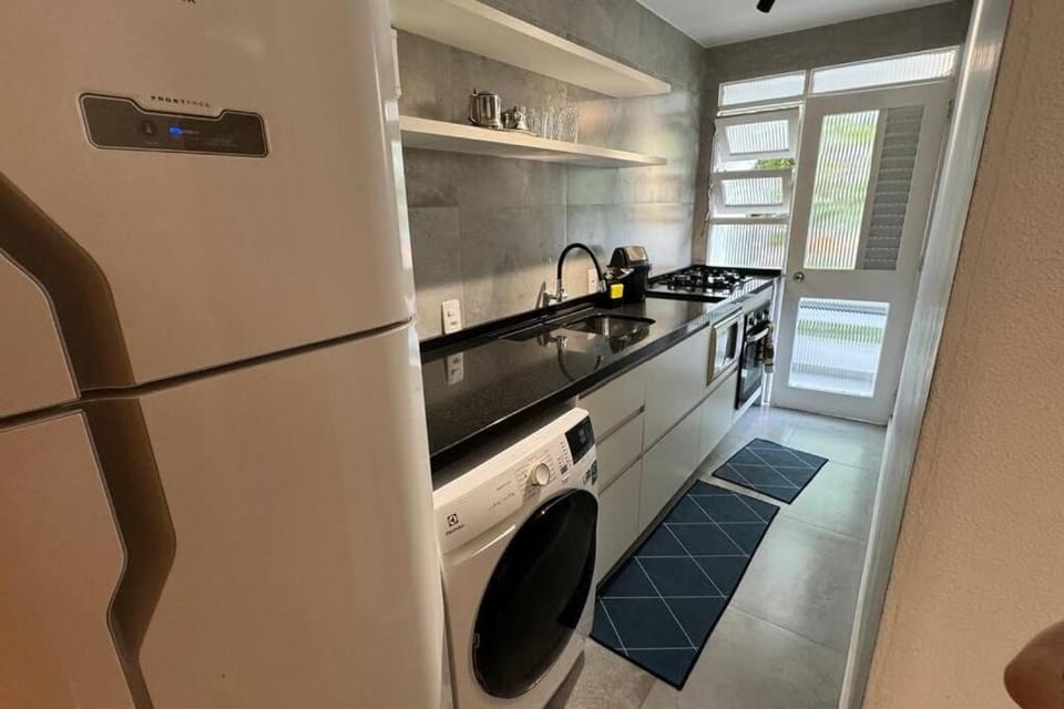 Kitchen or kitchenette, washing machine