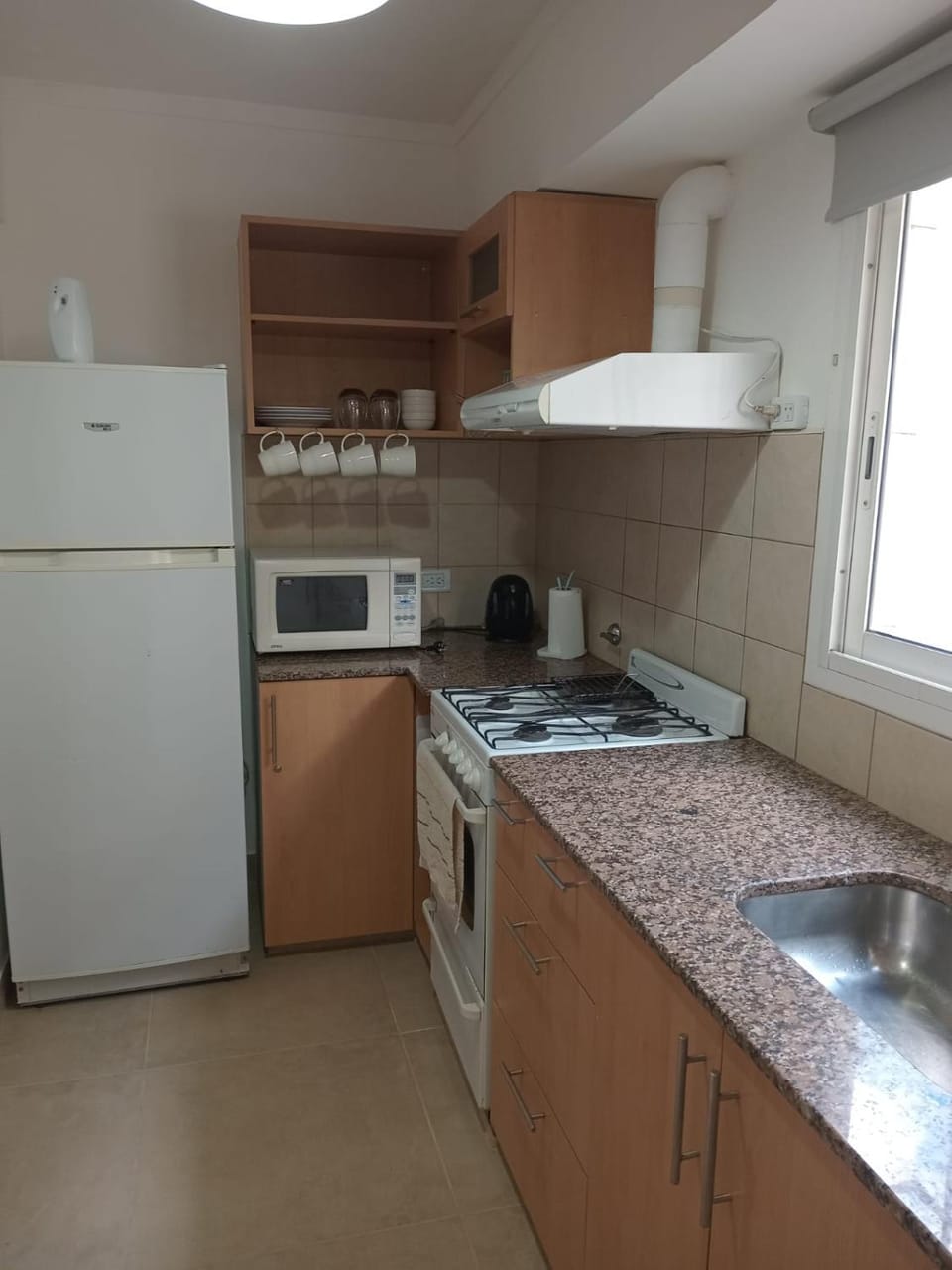 Kitchen or kitchenette, oven, stove