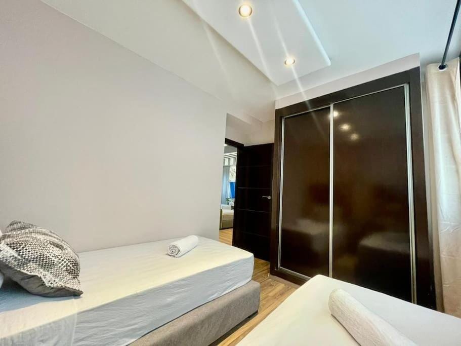 Bed, Photo of the whole room, Bedroom, towels, wardrobe