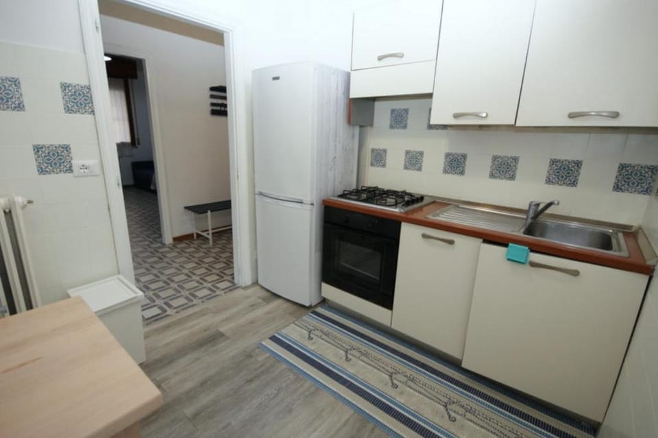 Kitchen or kitchenette, oven, stove
